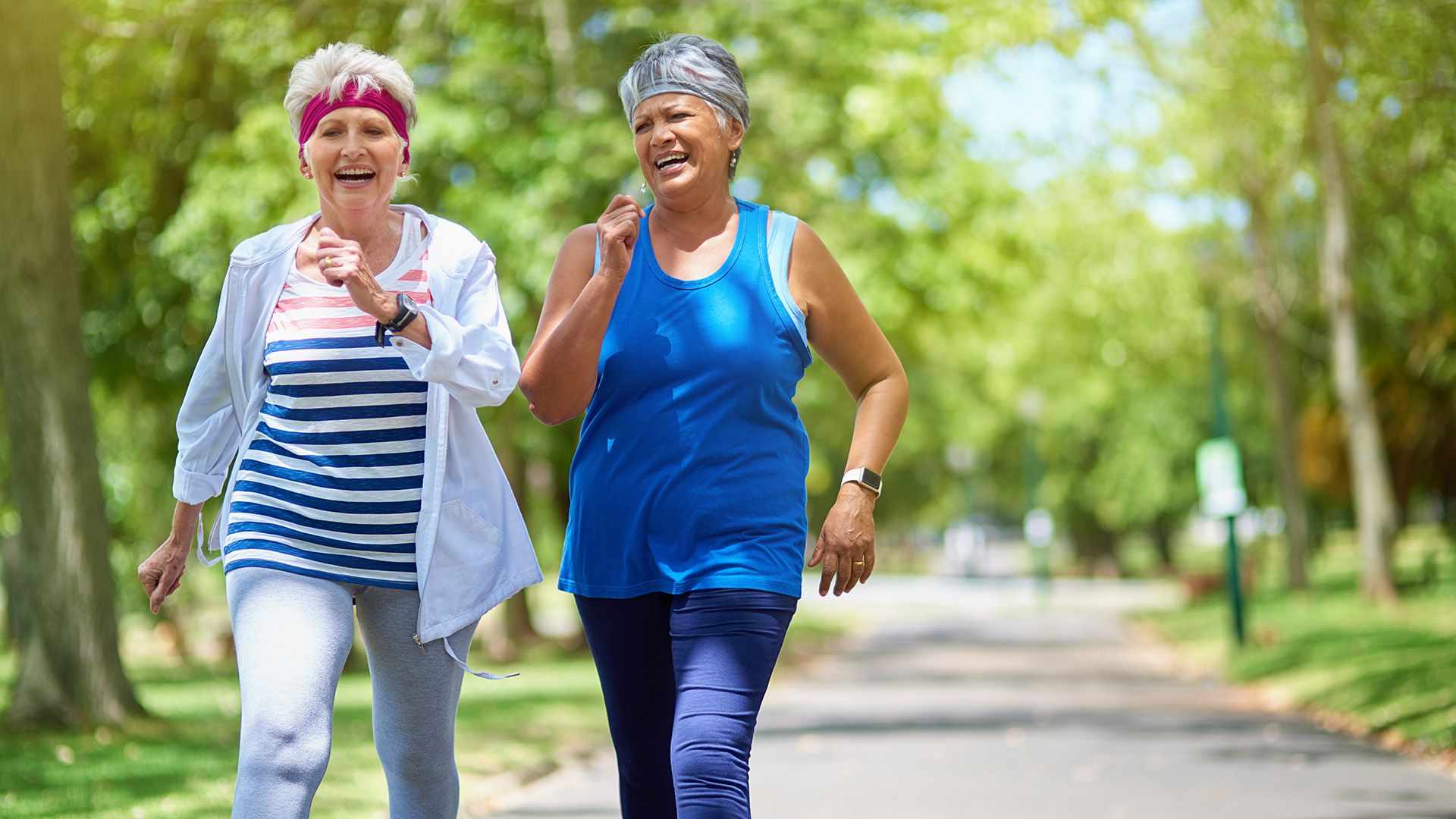 Shot of two elderly friends enjoying a run together outdoors