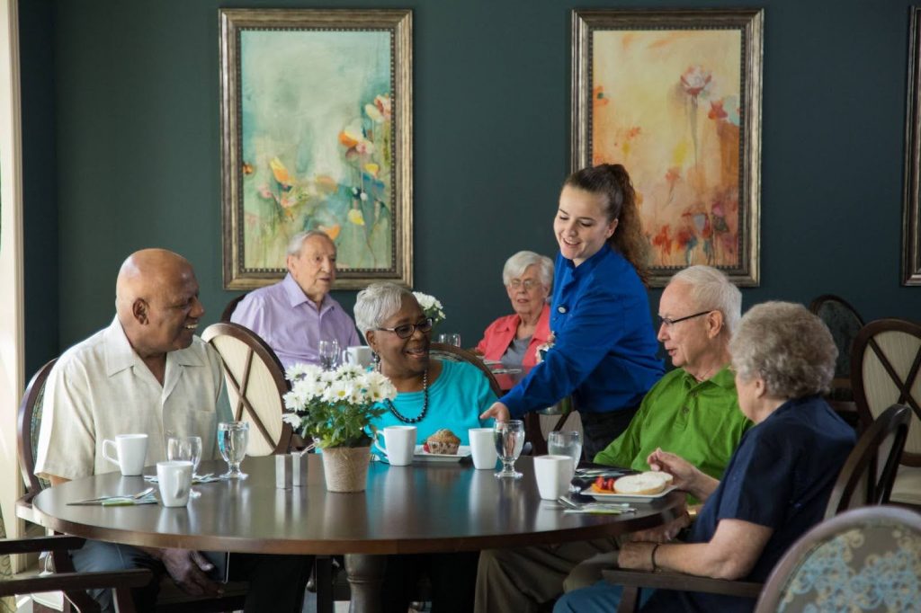 Group of seniors enjoying breakfast