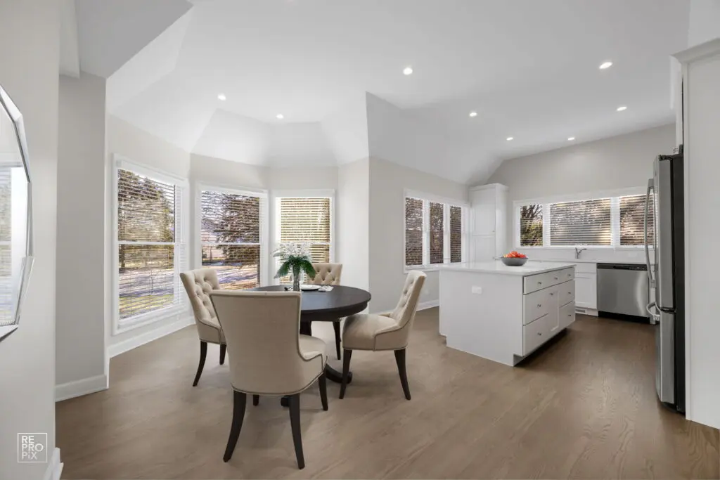 Bright, modern kitchen with dining area