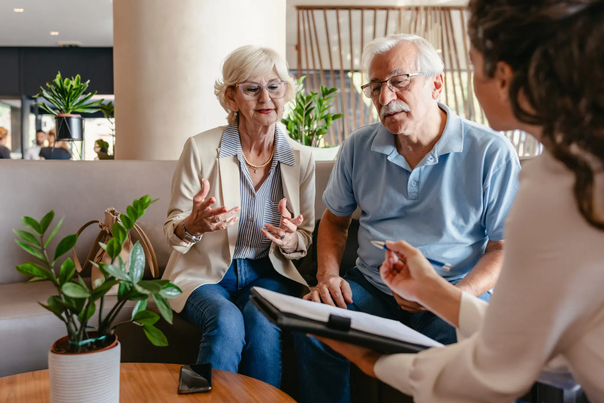 Senior couple considering their options at Wyndemere in Wheaton, IL.