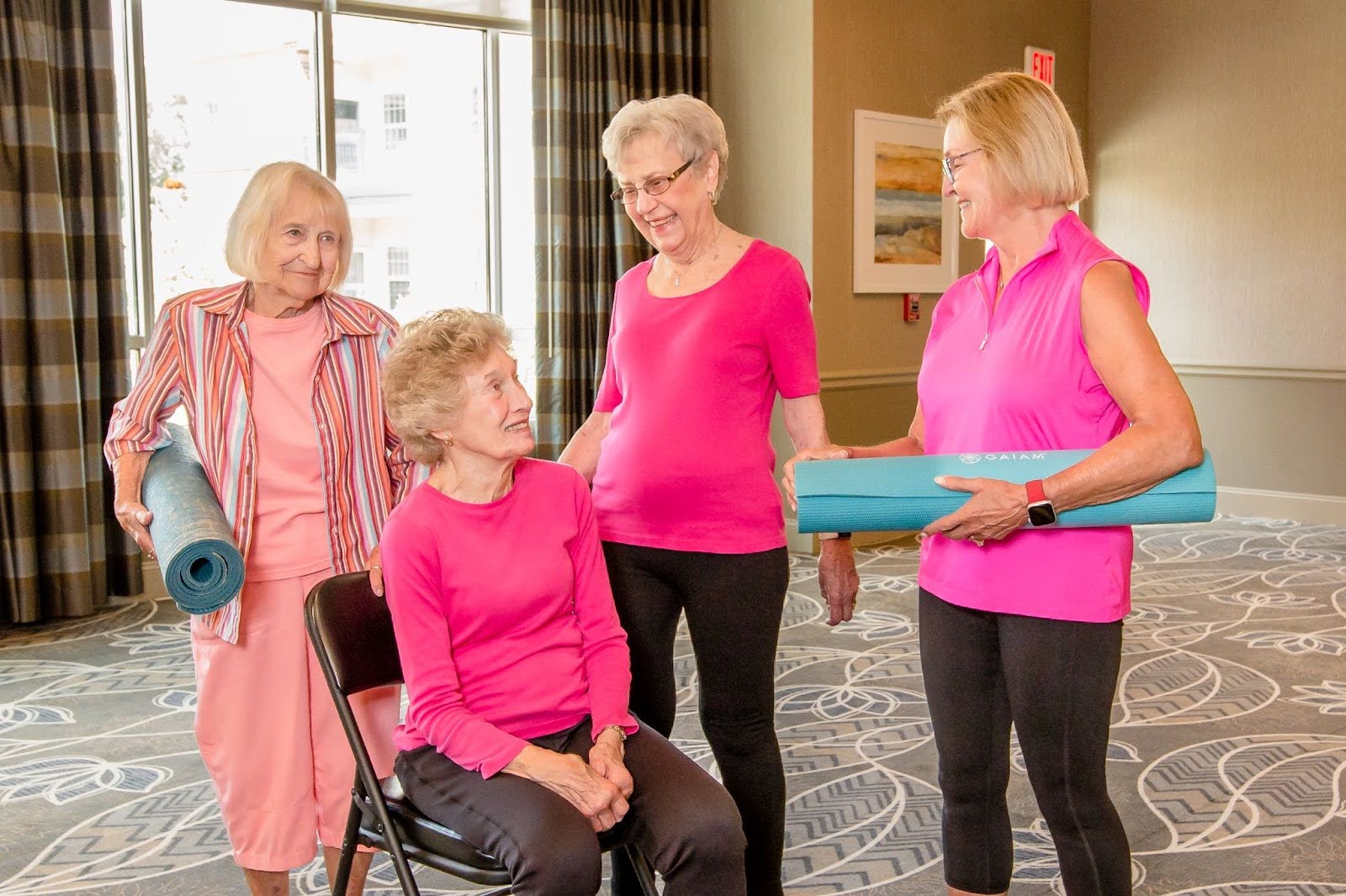 Senior women doing yoga